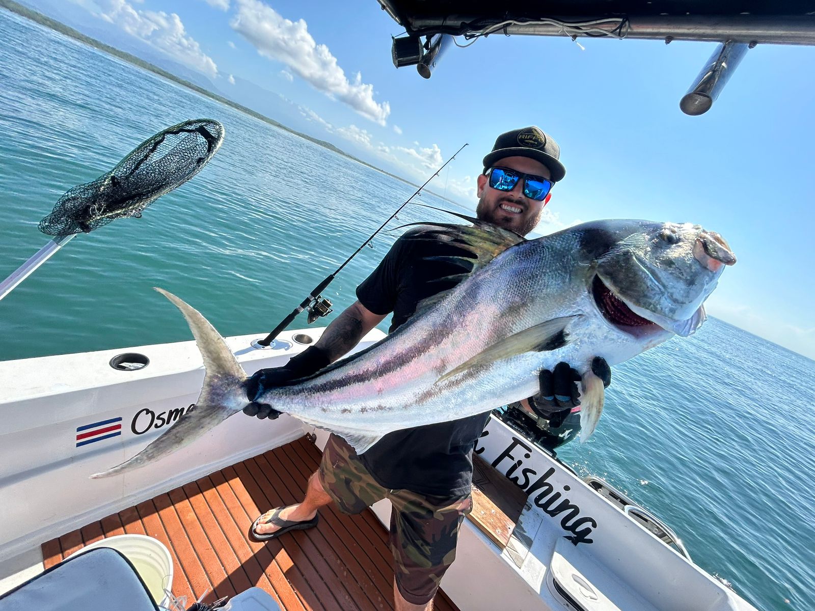 Captain Oscar with a prized catch